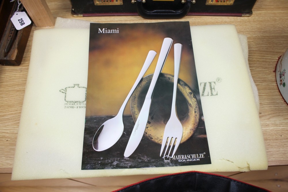 A Maier & Schulze stainless steel Miami pattern canteen for twelve, in original fitted briefcase